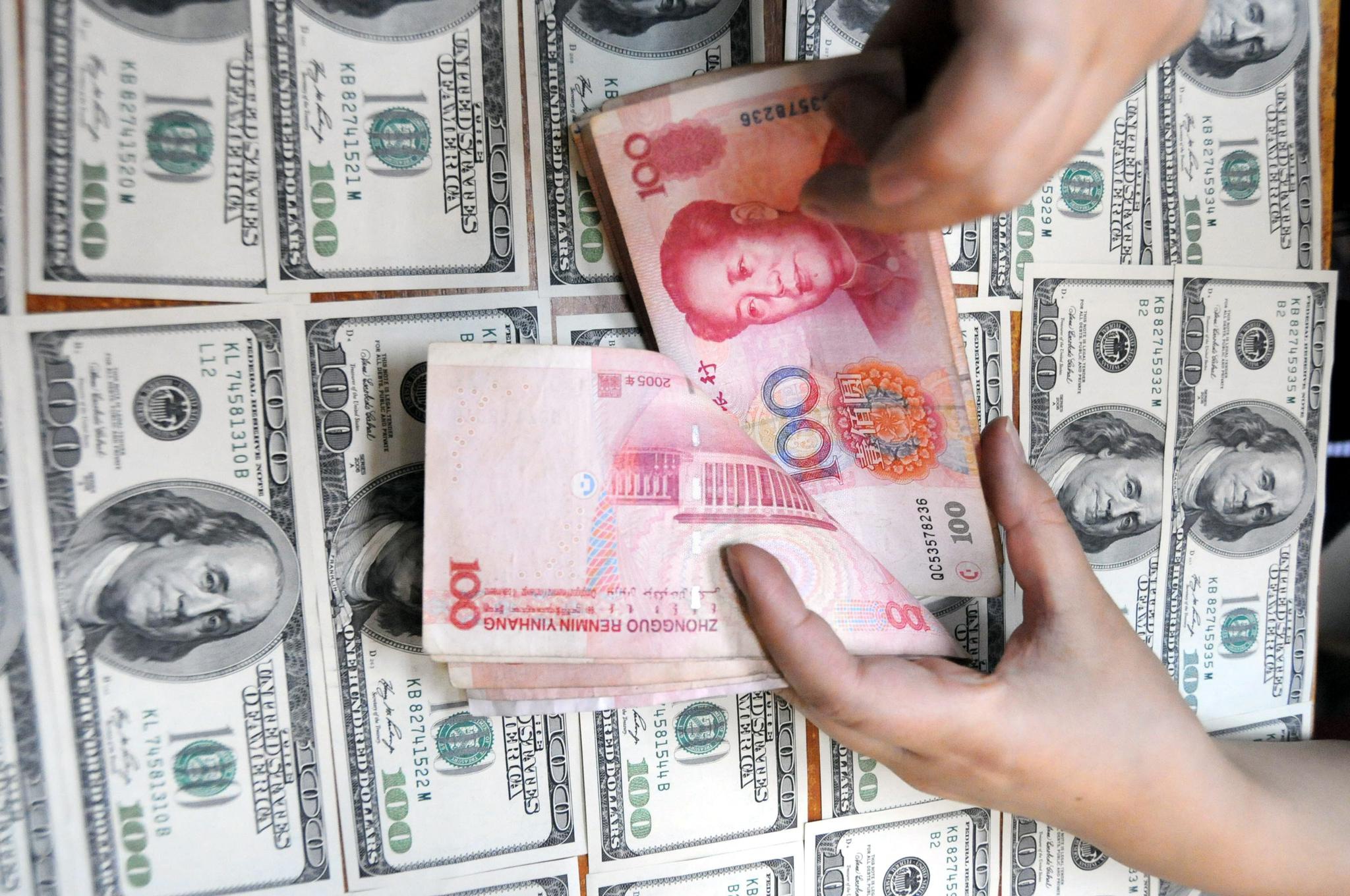 美金与人民币兑换多少(美金与人民币的兑换率是多少)