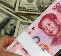 美元对人民币条件(美元对人民币升值还是贬值)